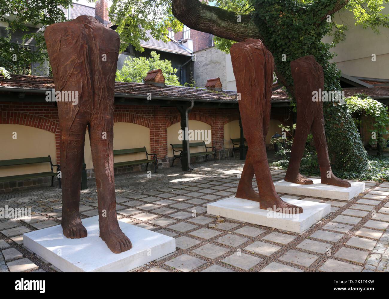 Cracow. Krakow. Poland. 'Walking Figures' made of cast iron sculptures by Magdalena Abakanowicz seen in the Czapski Palace (part of National Museum) Stock Photo