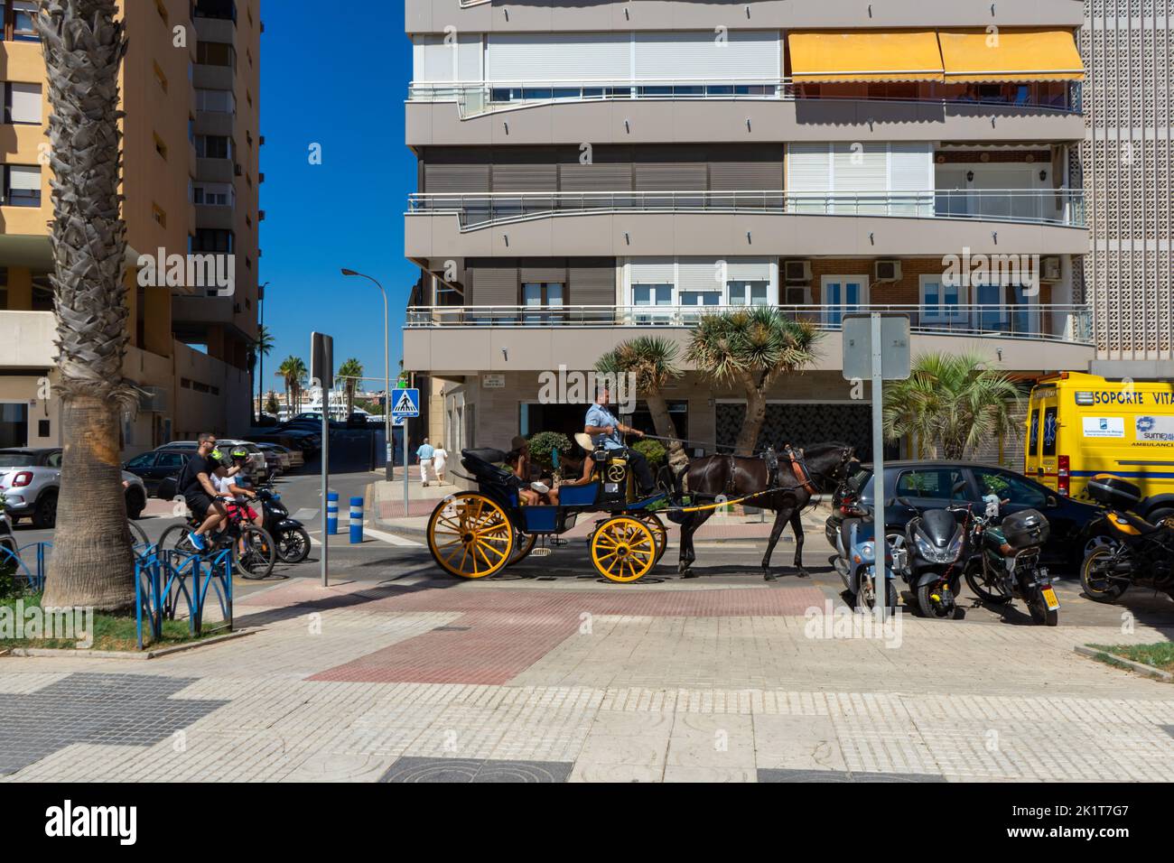 Tourists enjoying views by carriage in Malaga, Spain on September 4, 2022 Stock Photo