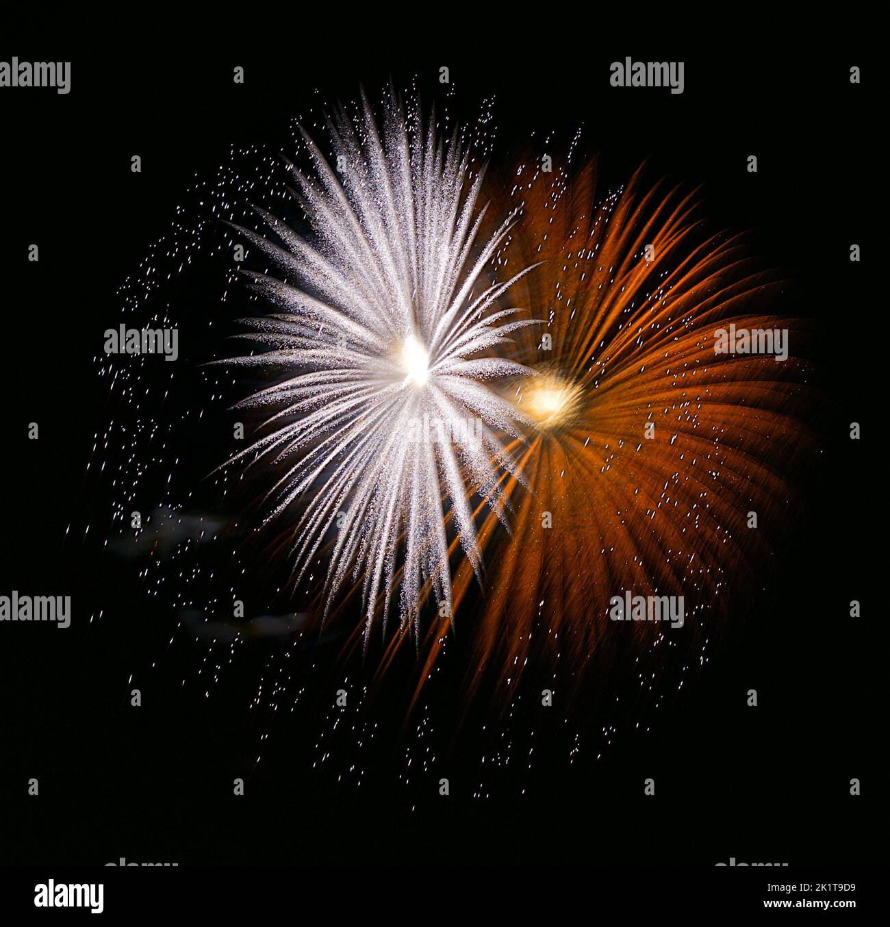 Yellow white artistic fireworks background, fireworks isolated, explode, phyrotecnic show Stock Photo