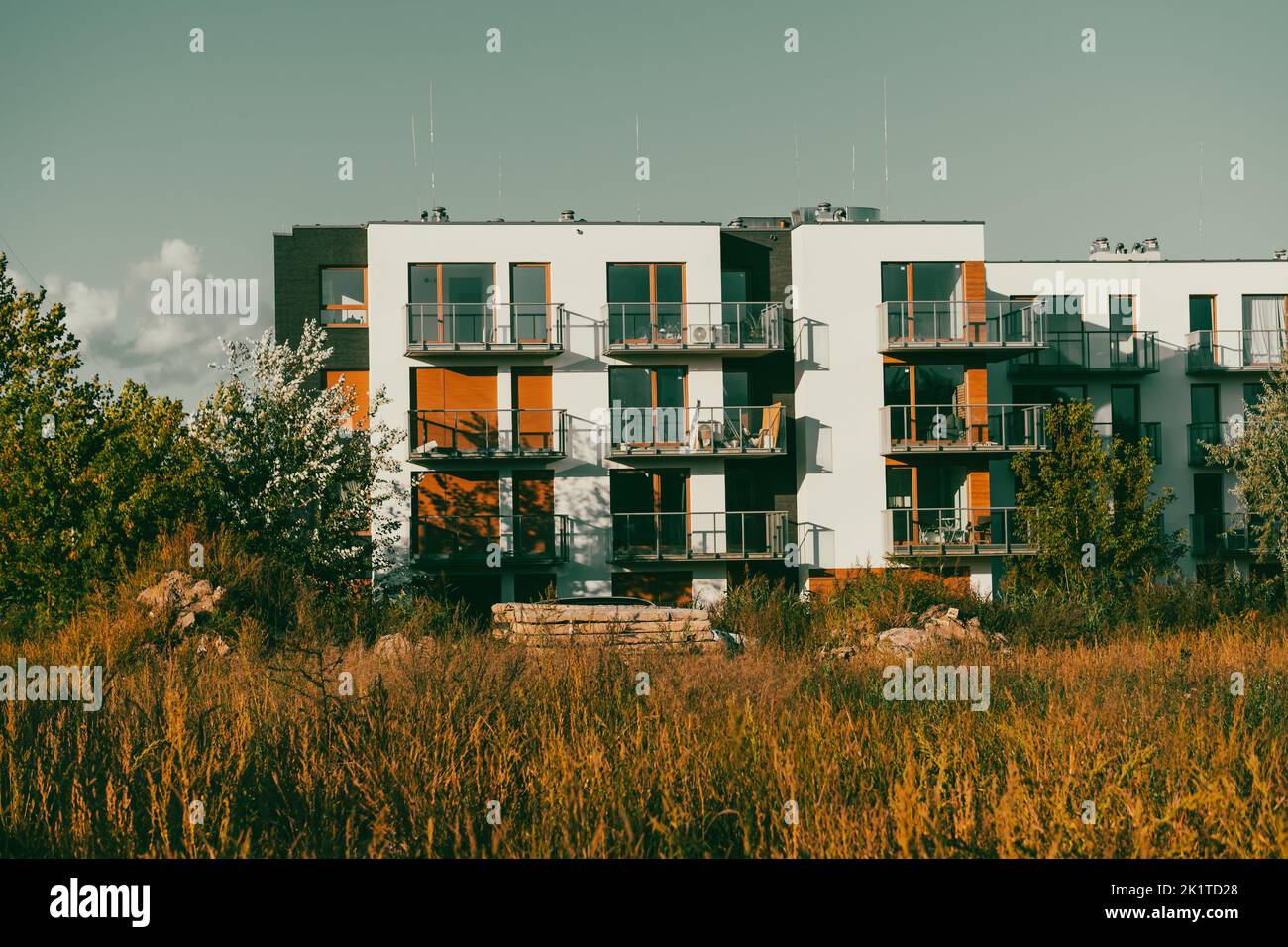 A new modern white orange apartment building on Bernata street in