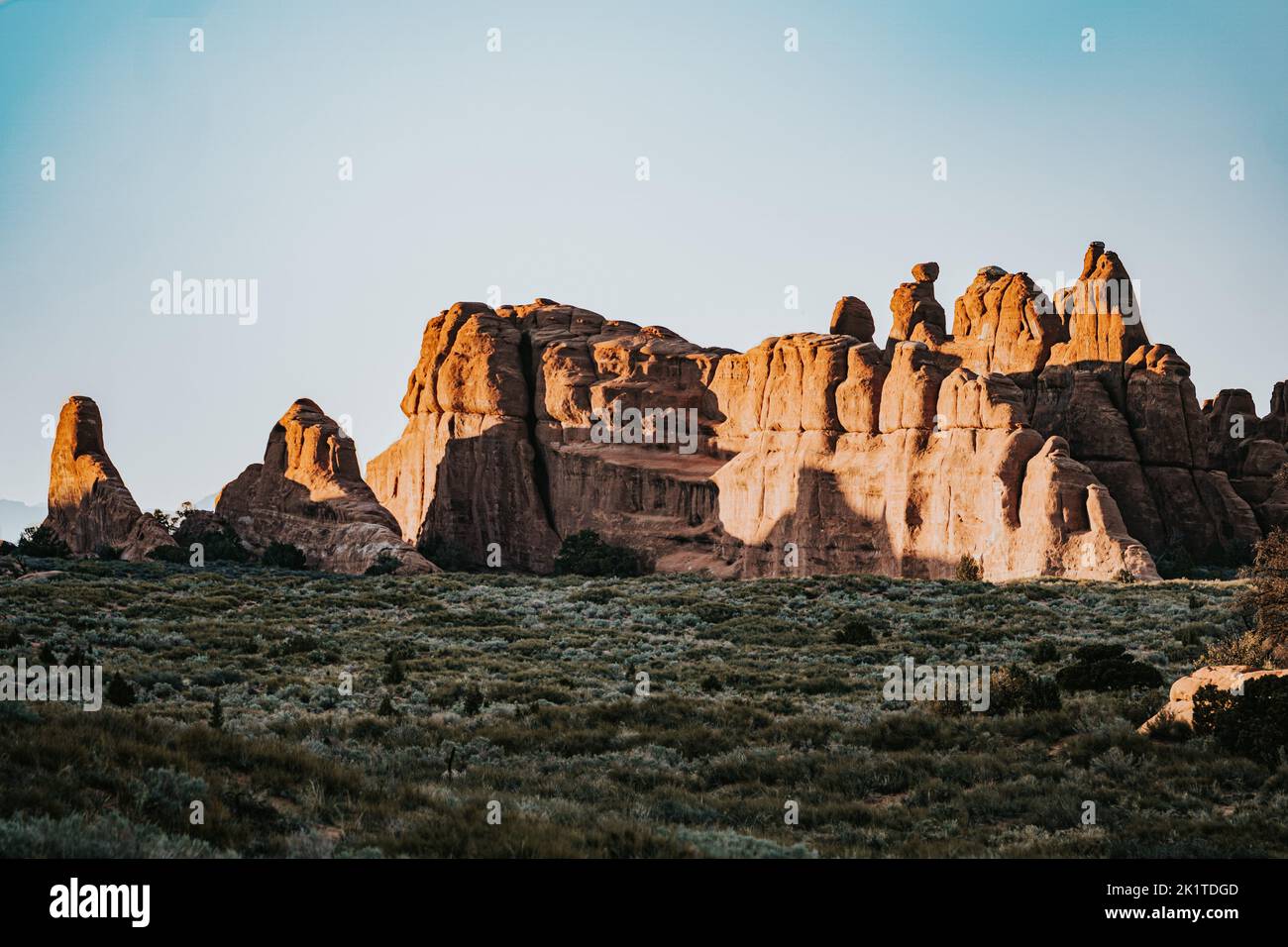 A shot of dry desert stones with some grass on a sunny day Stock Photo ...