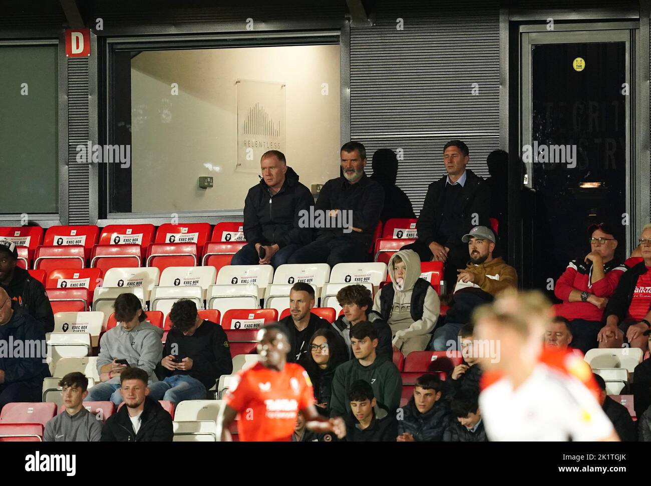 Salford City co-owner Paul Scholes and Roy Keane watch from the stands during the Papa John's Trophy group stage match at The Peninsula Stadium, Salford. Picture date: Tuesday September 20, 2022. Stock Photo