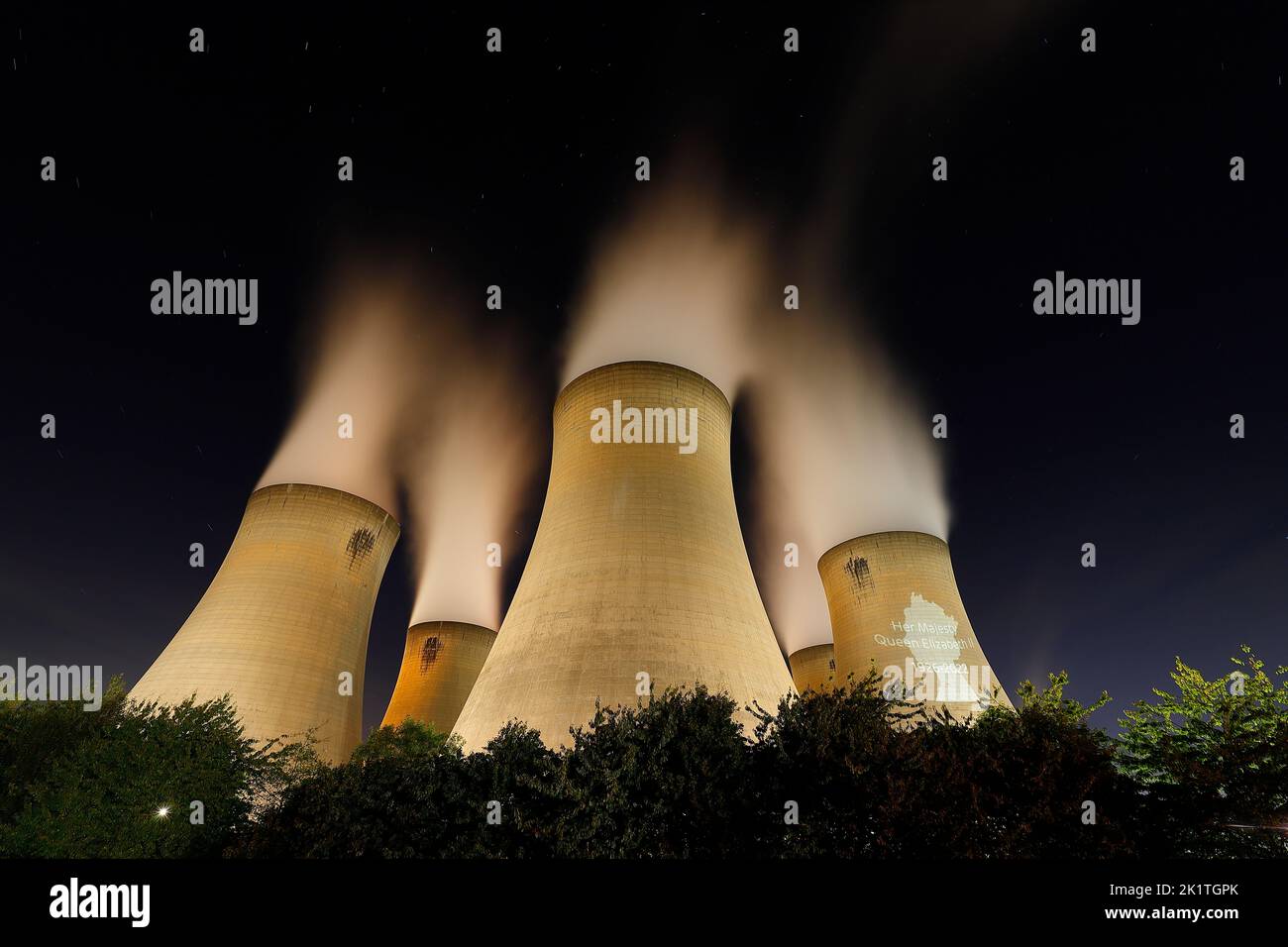 An outline of HRH Queen Elizabeth's head was projected onto one of the cooling towers of Drax Power Station to pay tribute after her death. Stock Photo