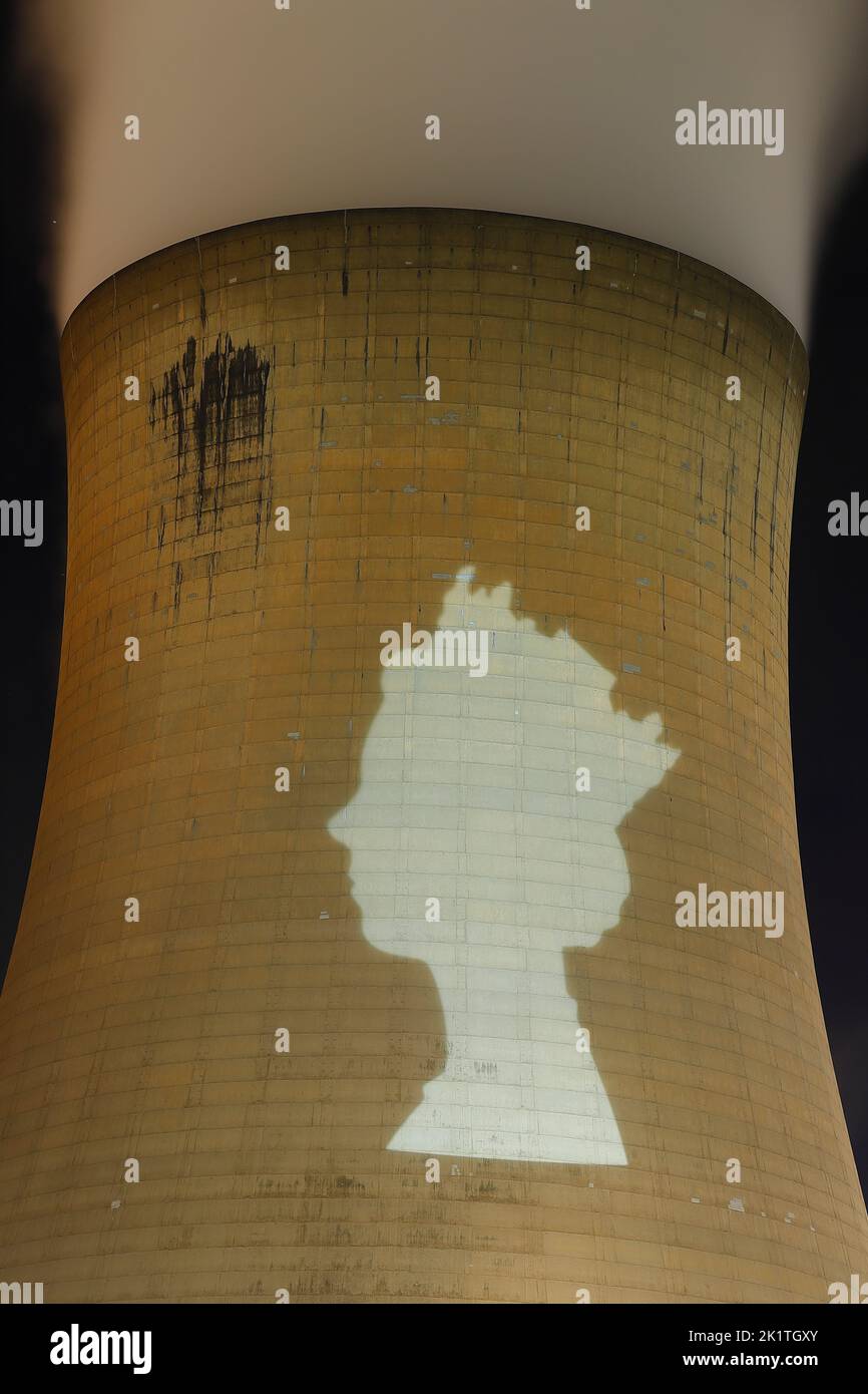 An outline of HRH Queen Elizabeth's head was projected onto one of the cooling towers of Drax Power Station to pay tribute after her death. Stock Photo