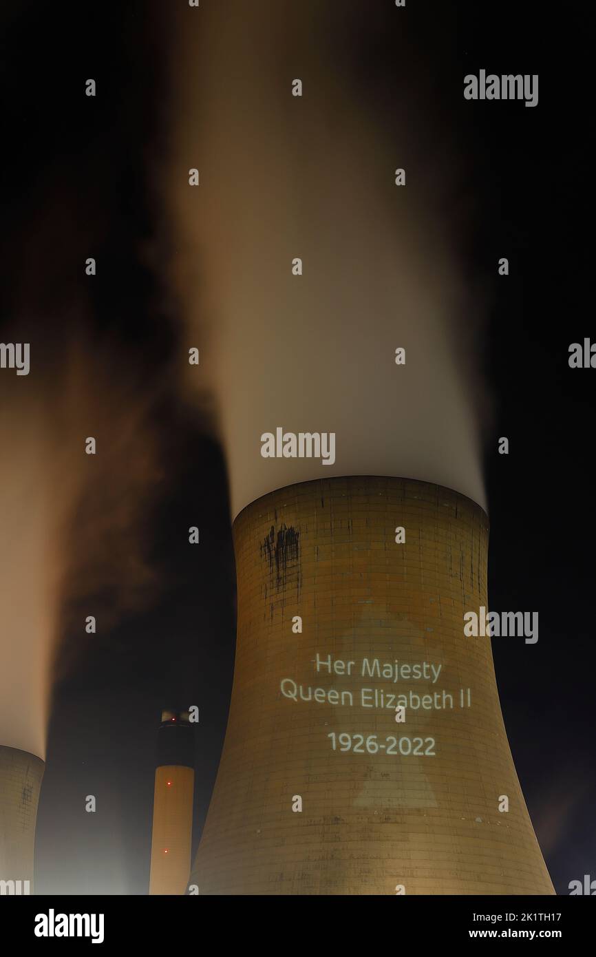 An outline of HRH Queen Elizabeth's head was projected onto one of the cooling towers of Drax Power Station to pay tribute after her death. Stock Photo