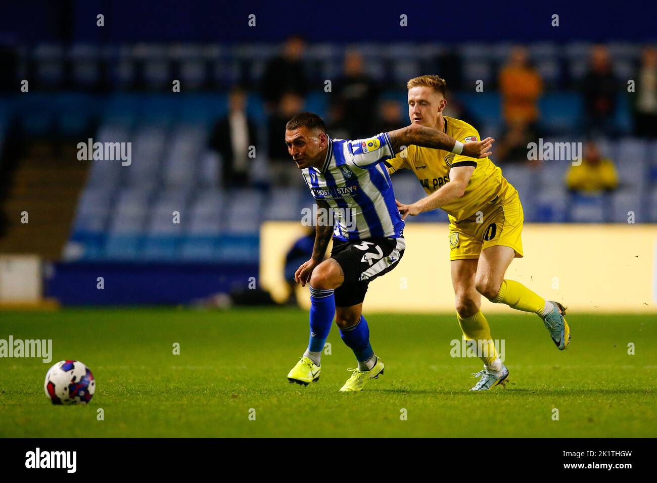 Jack Hunt #32 of Sheffield Wednesday and Davis Keillor-Dunn #10 of Burton Albion during the Papa John's Trophy match Sheffield Wednesday vs Burton Albion at Hillsborough, Sheffield, United Kingdom, 20th September 2022  (Photo by Ben Early/News Images) Stock Photo
