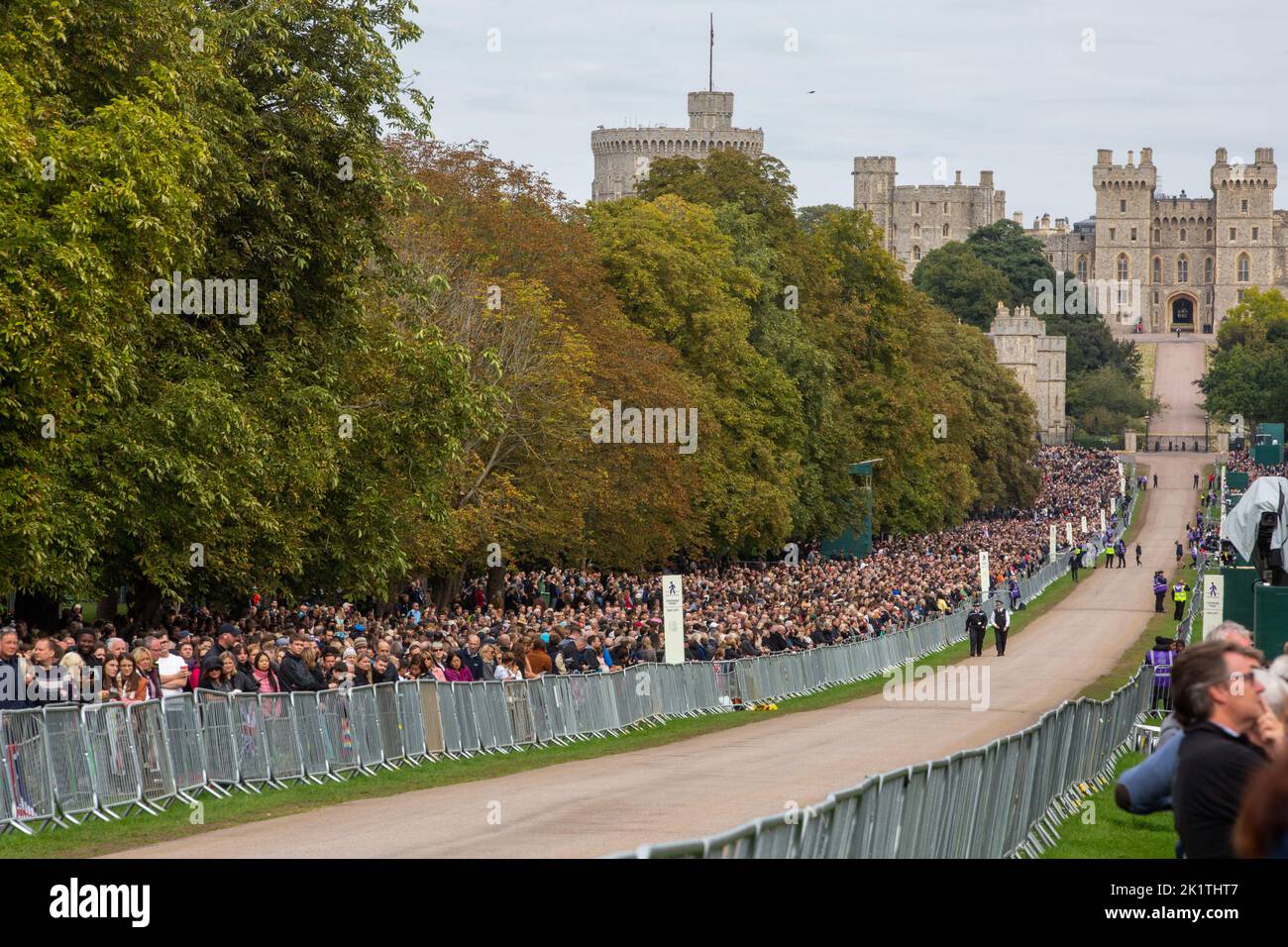 Windsor, UK. 19th September, 2022. Thousands of mourners line the Long Walk in Windsor Great Park to view the procession of Queen Elizabeth II's coffin in the State Hearse to St George’s Chapel for the Committal Service. Queen Elizabeth II, the UK's longest-serving monarch, died at Balmoral aged 96 on 8th September 2022 after a reign lasting 70 years. Credit: Mark Kerrison/Alamy Live News Stock Photo