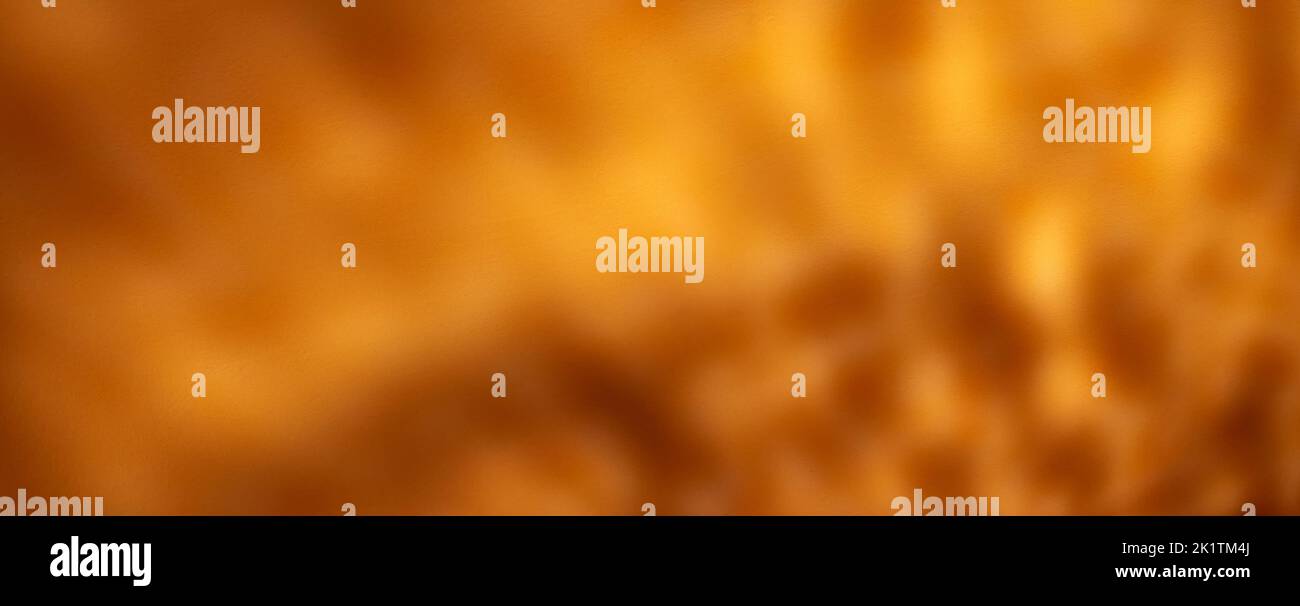 orange panoramic abstract wavy ligt pattern or background Stock Photo