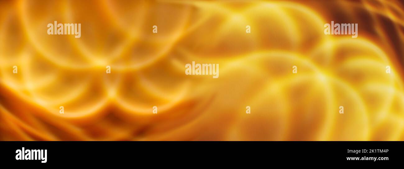 panoramic abstract orange wavy ligt pattern or background Stock Photo