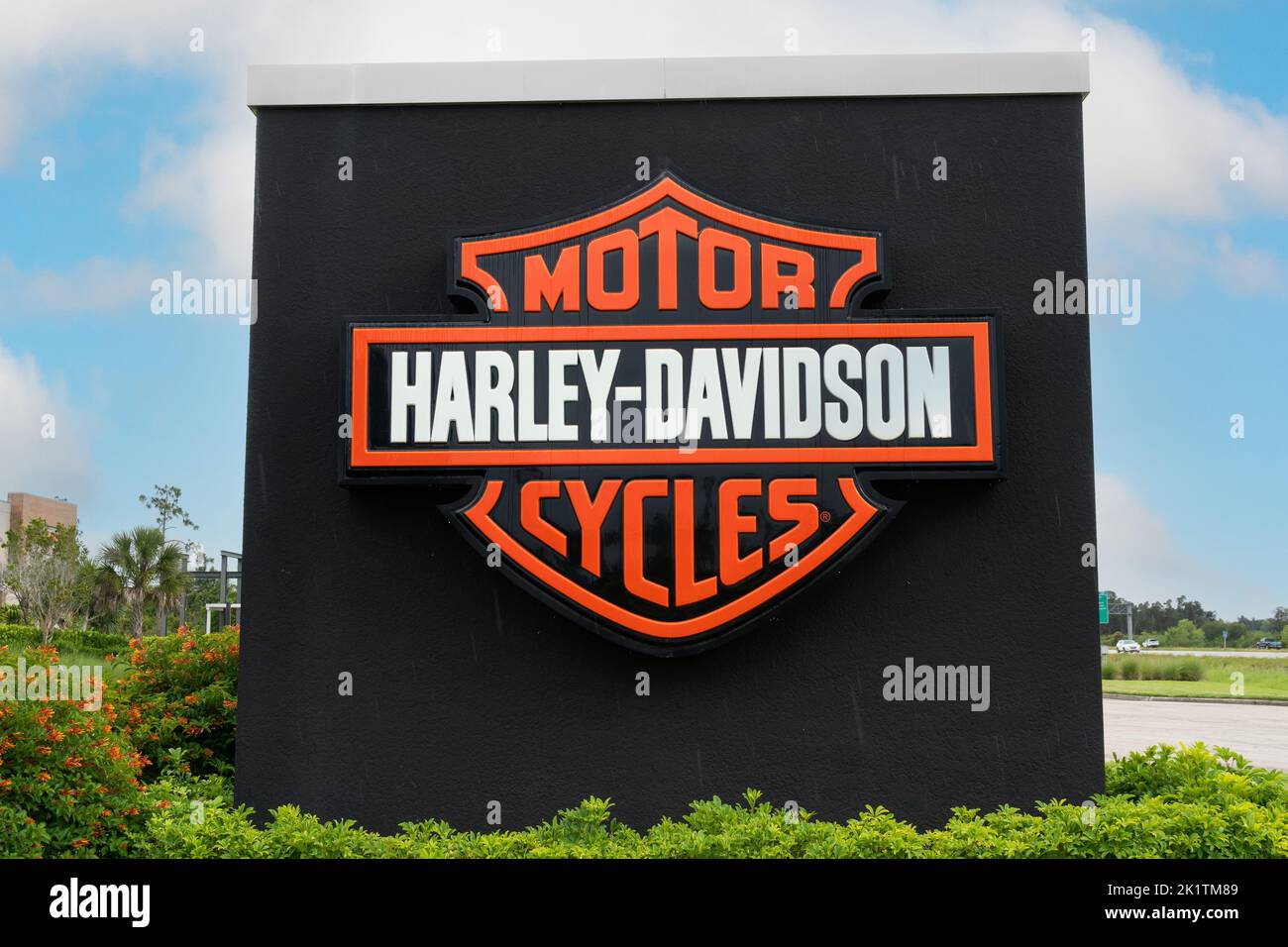 FORT MYERS, FL, USA - JULY 6 2022: Harley-Davidson dealership exterior sign and trademark logo. Stock Photo