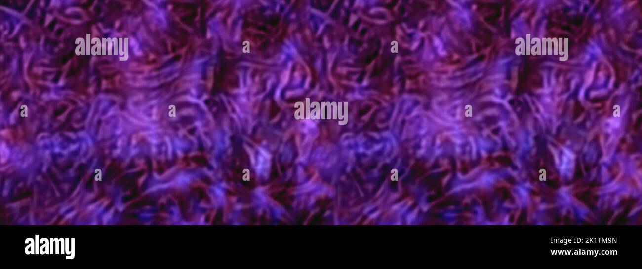 defocused purple wavy ligt pattern or background Stock Photo