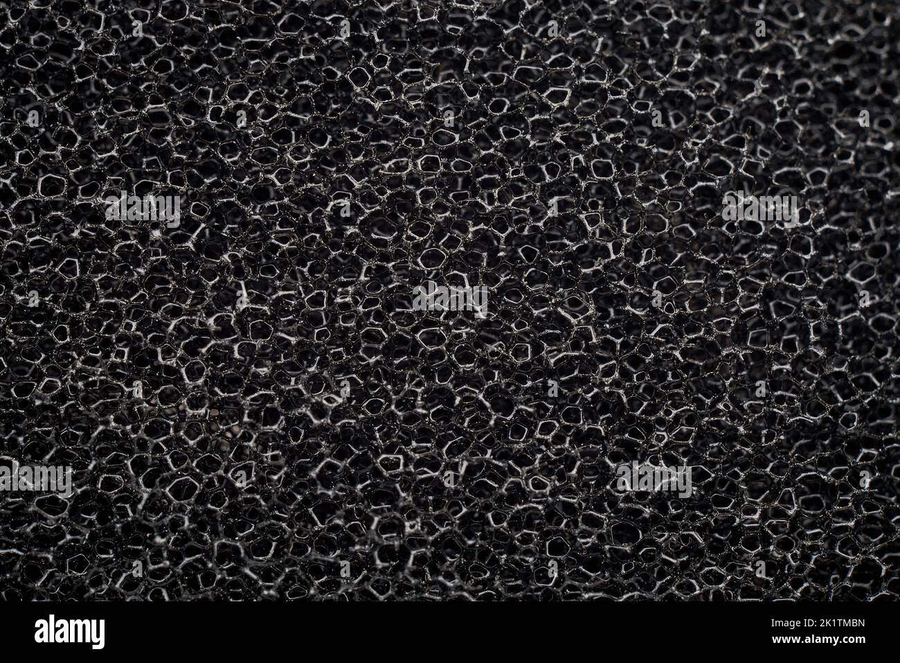 banner of macro black polyurethane foam rubber washcloth sponge Stock Photo