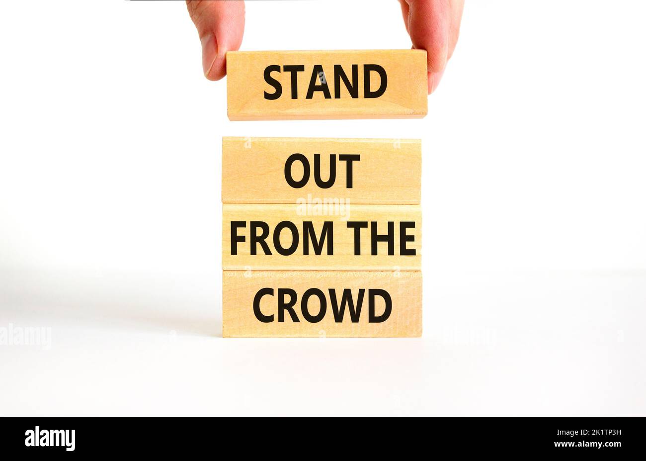 Stand out from the crowd symbol. Concept words Stand out from the crowd