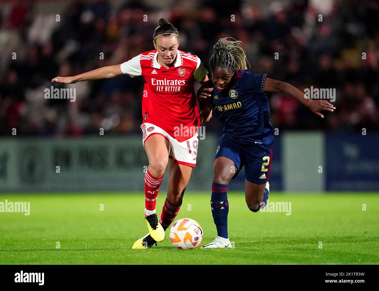 Arsenal's Caitlin Foord (left) and Ajax's Liza van der Most battle for the ball during the UEFA Women's Champions League second round first leg match at the LV Bet Stadium Meadow Park, London. Picture date: Tuesday September 20, 2022. Stock Photo