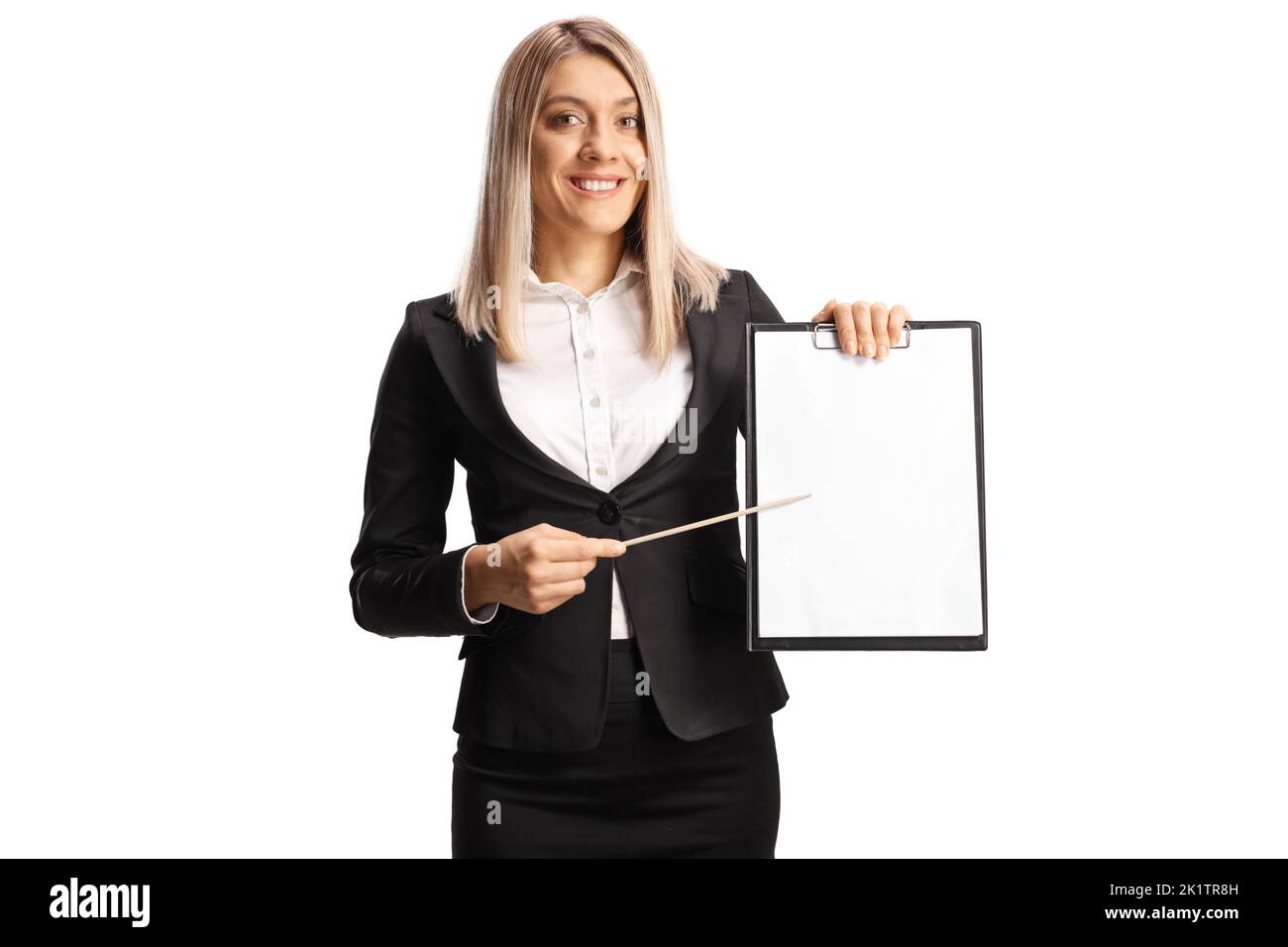 Businesswoman smiling and presenting with a clipboard isolated on white background Stock Photo