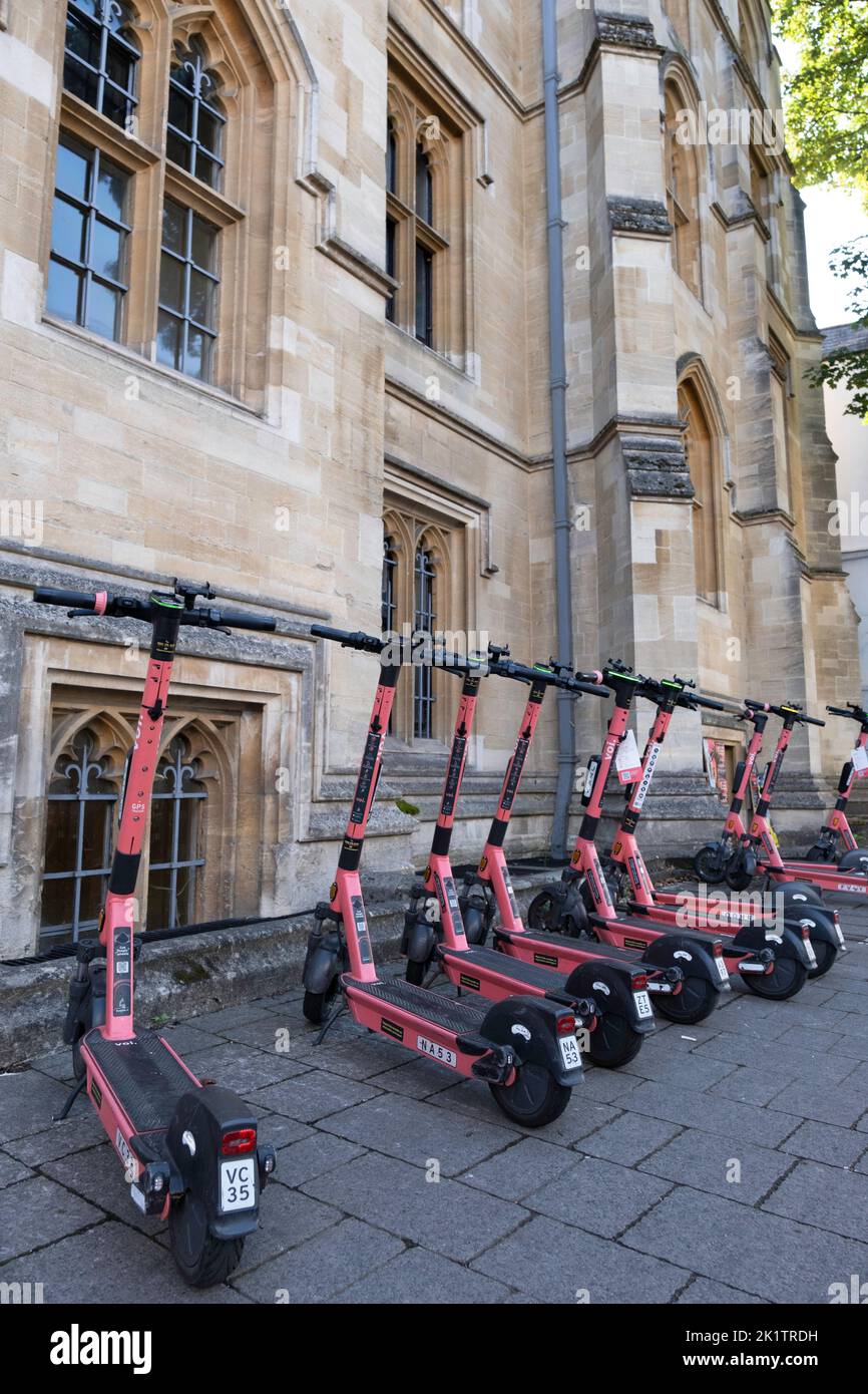 Shared Escooters or esteps of the company VOI for rent in a street in Oxford, England. E