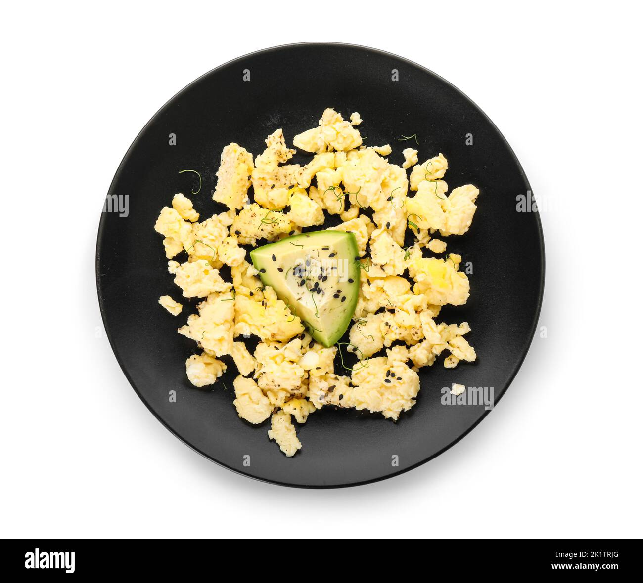 Plate of tasty scrambled eggs isolated on white background Stock Photo ...