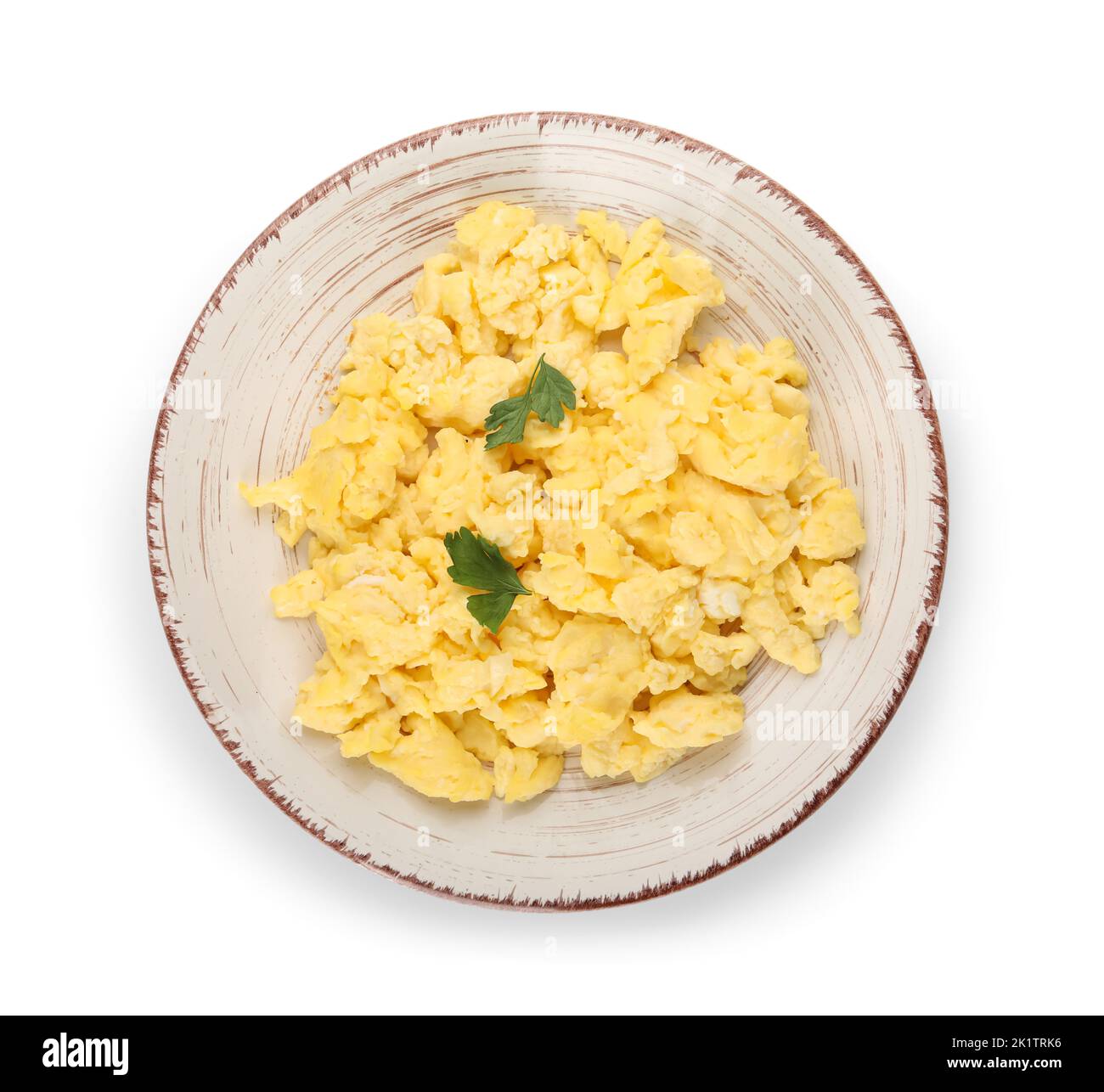 Plate of tasty scrambled eggs isolated on white background Stock Photo ...