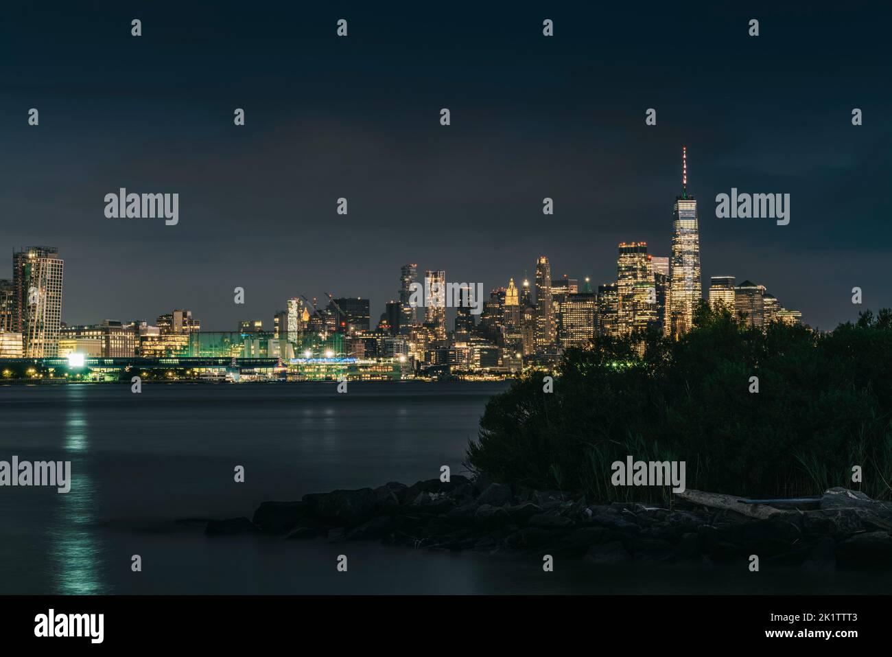 New York City skyline at night. View from Hudson river, New York, USA ...