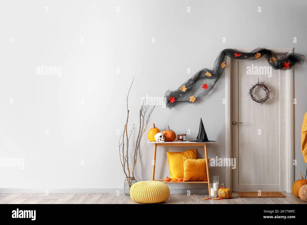 Interior of hall decorated for Halloween with table and door Stock ...
