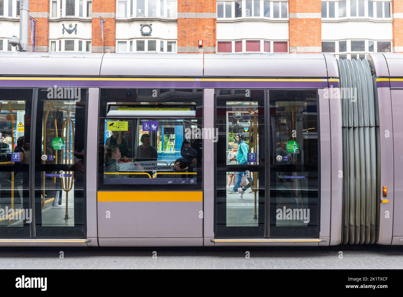 LUAS tram at a tram stop in Dublin City Centre, Ireland. Stock Photo