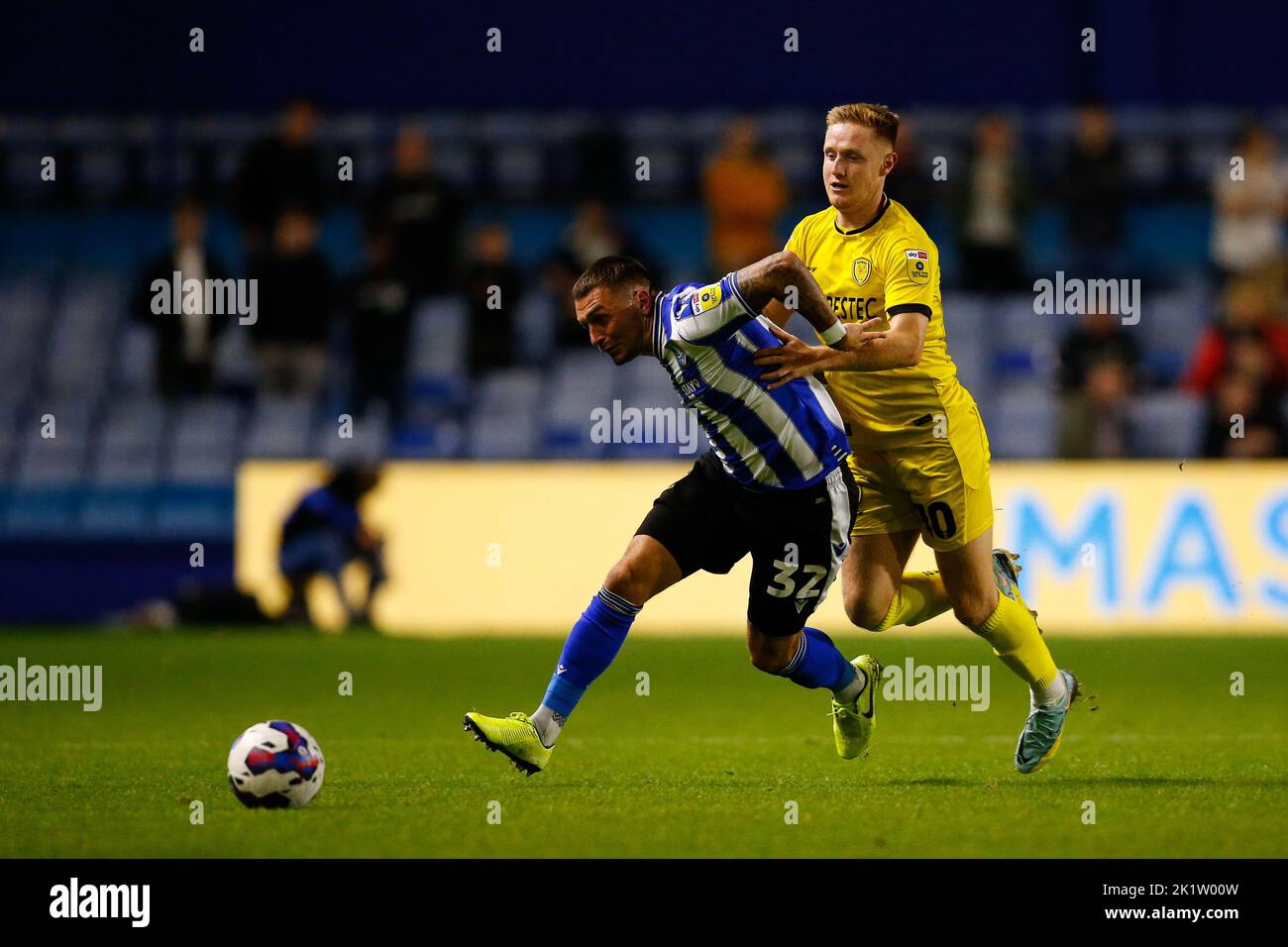 Jack Hunt #32 of Sheffield Wednesday and Davis Keillor-Dunn #10 of Burton Albion during the Papa John's Trophy match Sheffield Wednesday vs Burton Albion at Hillsborough, Sheffield, United Kingdom, 20th September 2022  (Photo by Ben Early/News Images) Stock Photo