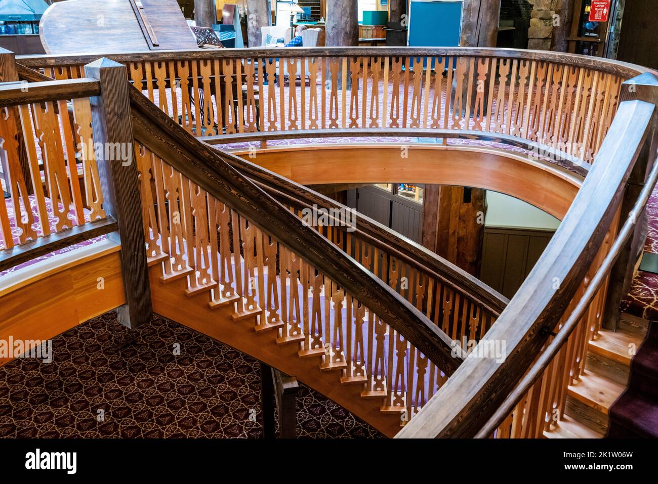 Elaborate winding wooden staircase; Many Glacier Hotel; Glacier National Park; Montana; USA Stock Photo