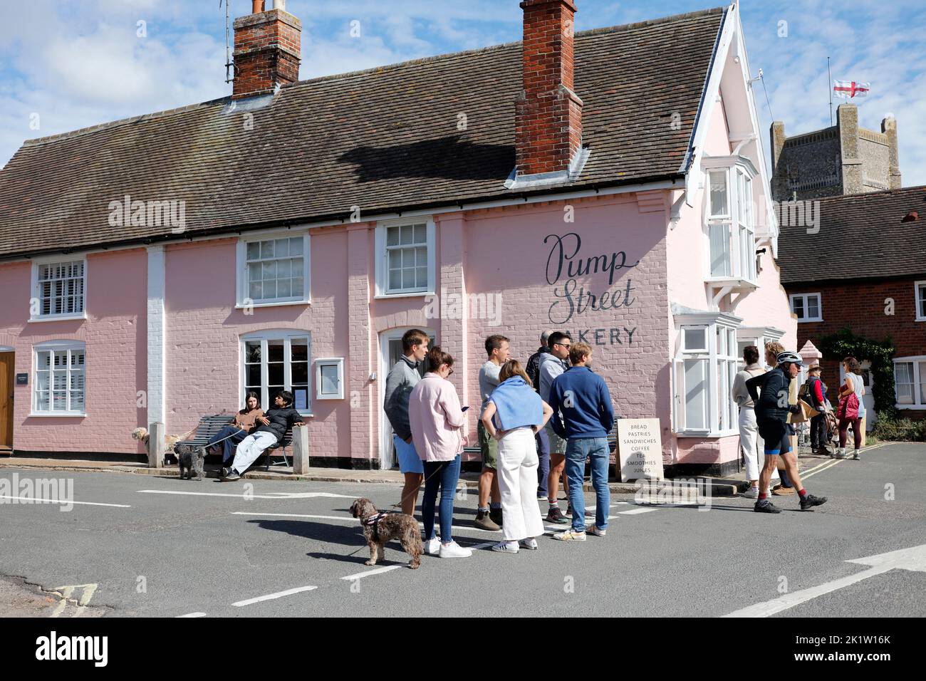 Busy street scene in the popular Pump Street and Market Hill, Orford, , Suffolk, England, United Kingdom Stock Photo