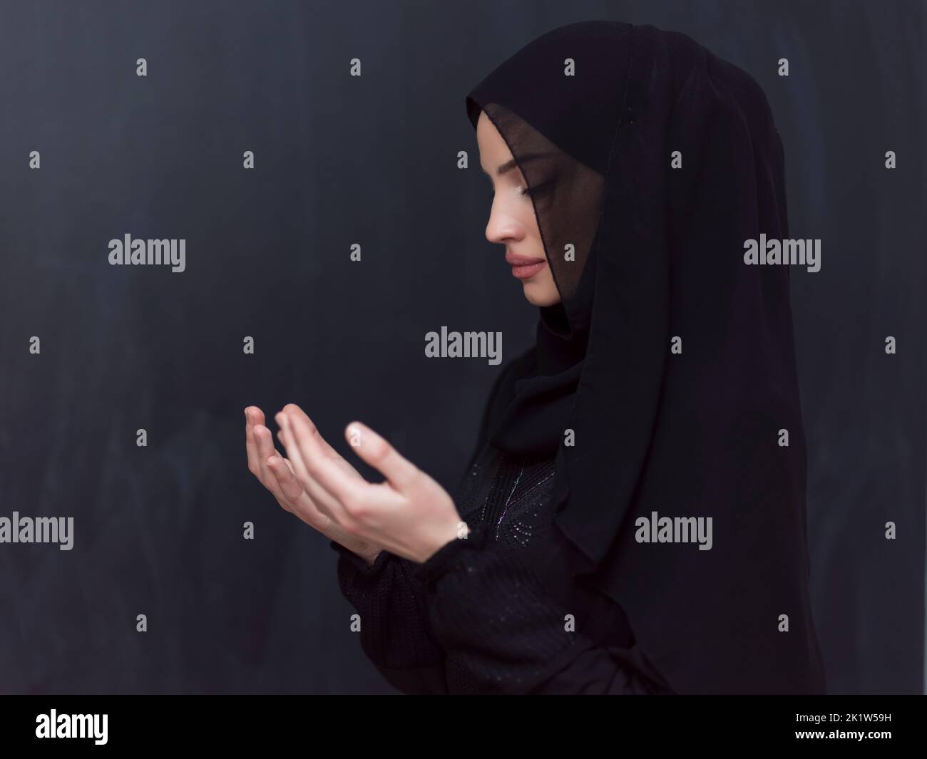 Portrait of young Muslim woman making dua Stock Photo - Alamy