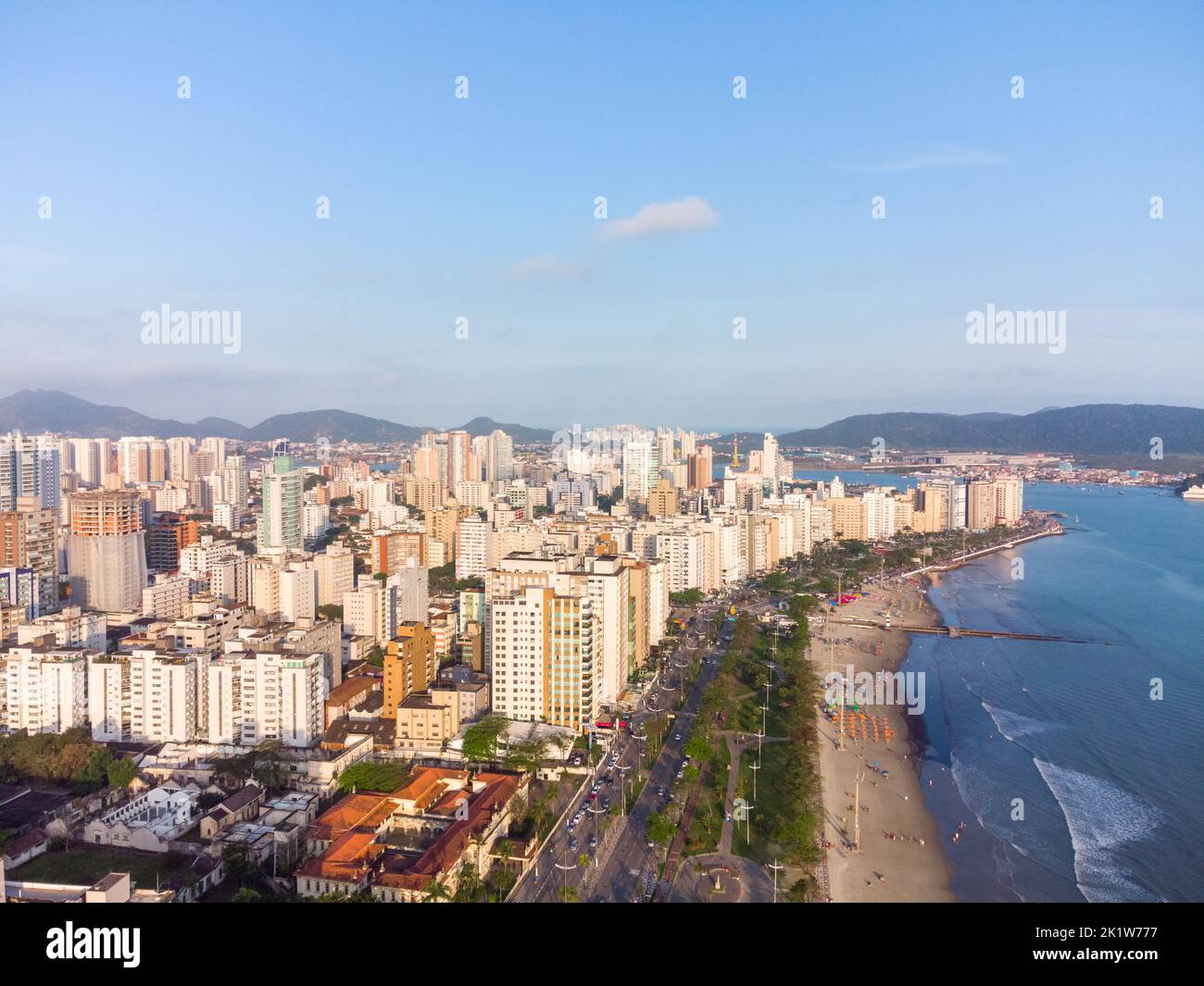 Aerial view of the waterfront to the ocean with its high buildings in