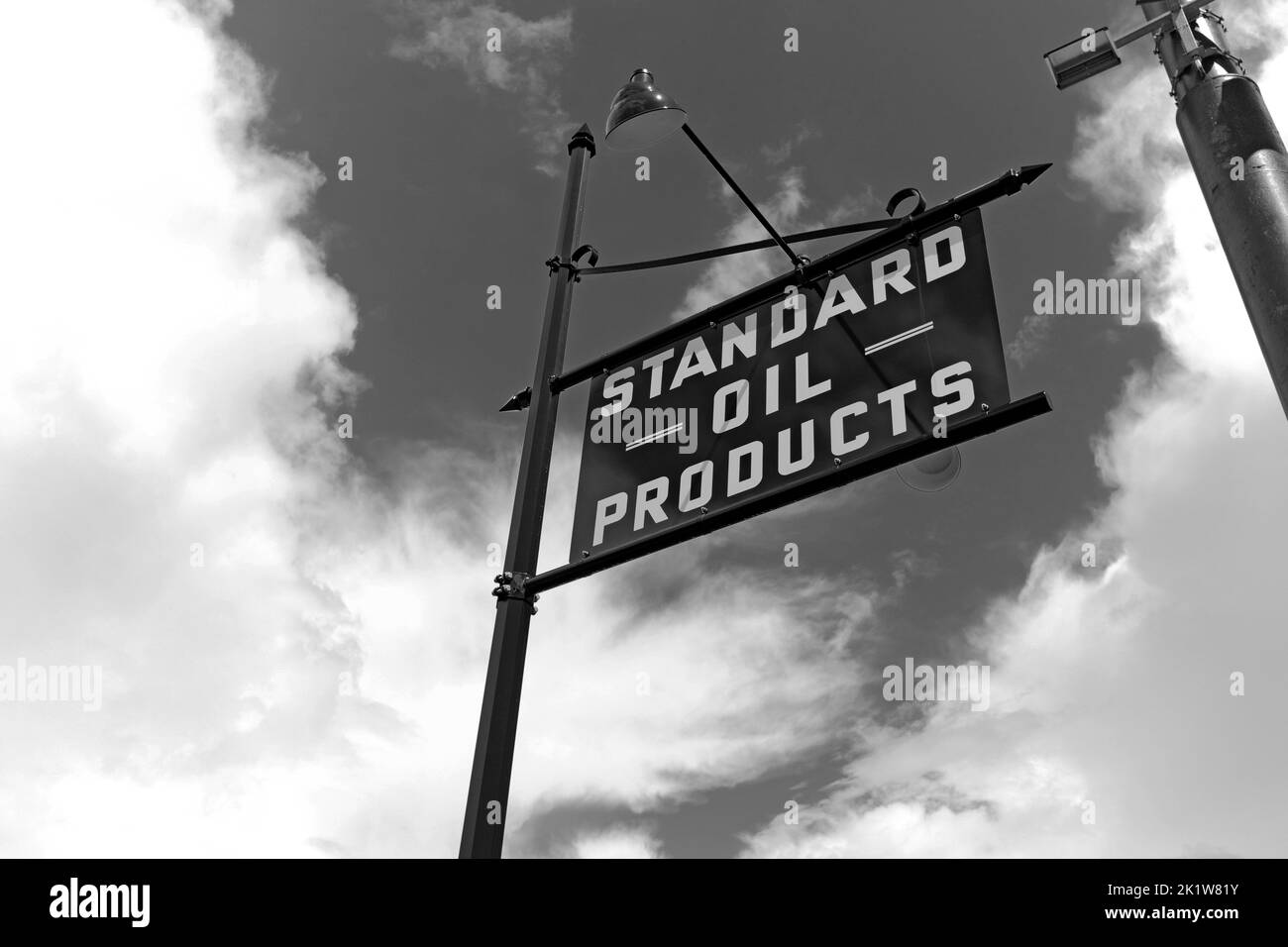 Black and White antique-style Standard Oil Products sign. Stock Photo