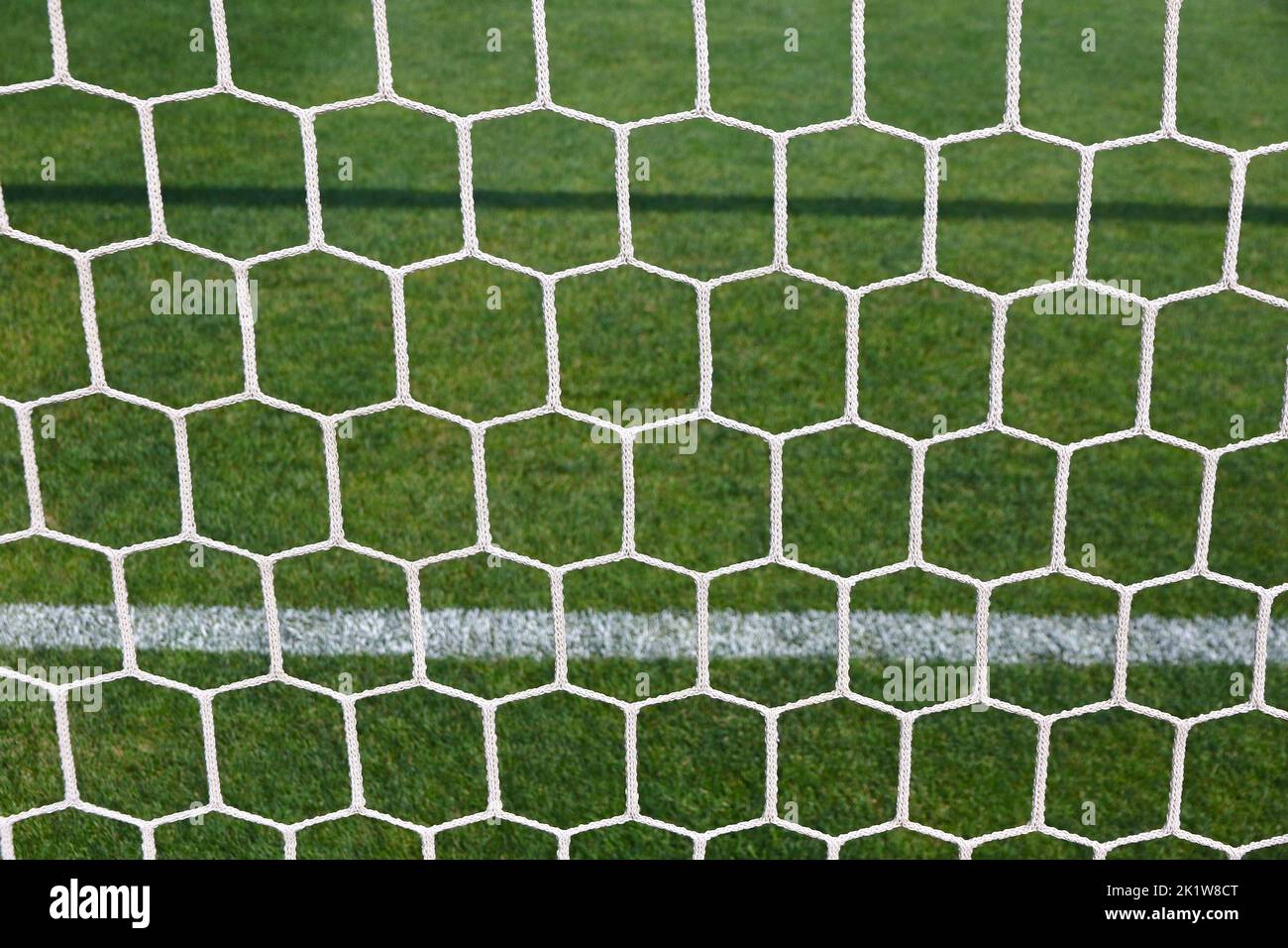 Close-up goal net, details of football soccer stadium. View behind the net Stock Photo