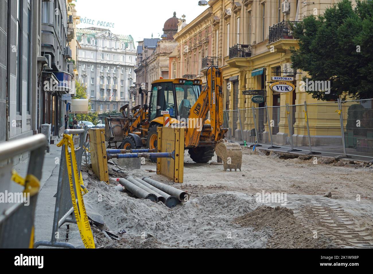 Belgrade, Serbia - August 30, 2015: Jcb backhoe loader at street construction site in capital city center summer works. Stock Photo