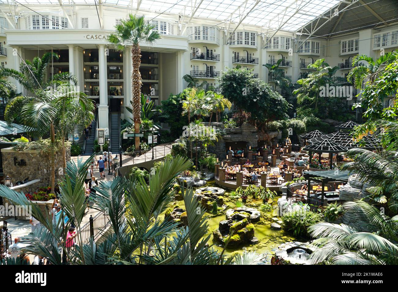 Nashville, Tennessee, U.S.A - June 26, 2022 - The restaurant and tropical plants inside of Gaylord Opryland Resort and Convention Center Stock Photo