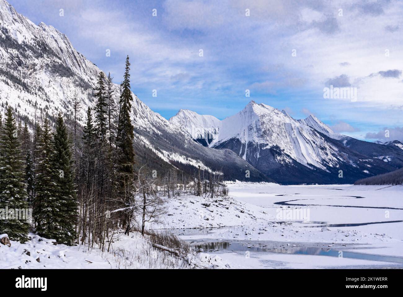 A mountain and forest scenic along the Maligne Lake road in winter, Jasper National Park, Alberta, Canada. Stock Photo