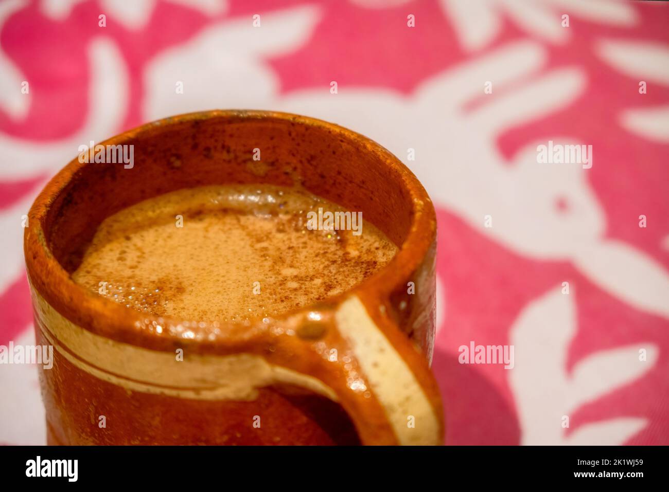 A Mexican pitcher with traditional hot chocolate with copyspace Stock ...