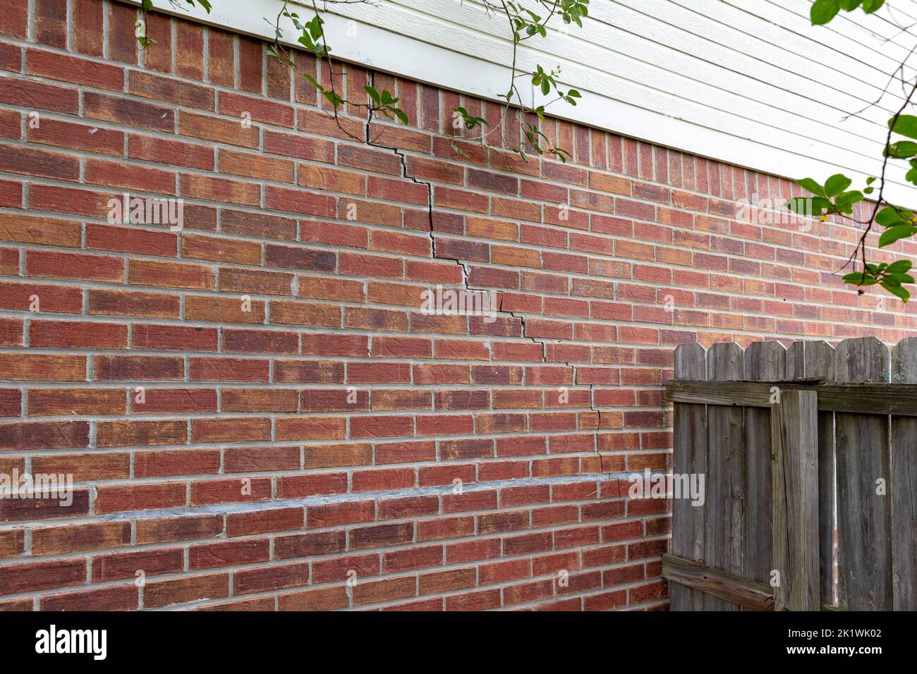 Crack in brick wall of a house Stock Photo
