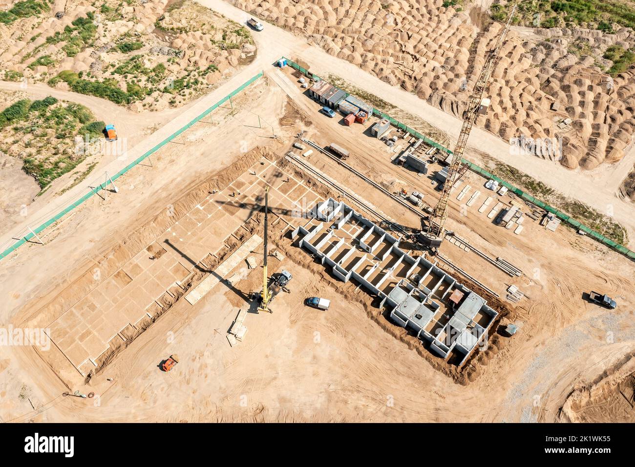construction of concrete foundation for new apartment building. aerial view. Stock Photo