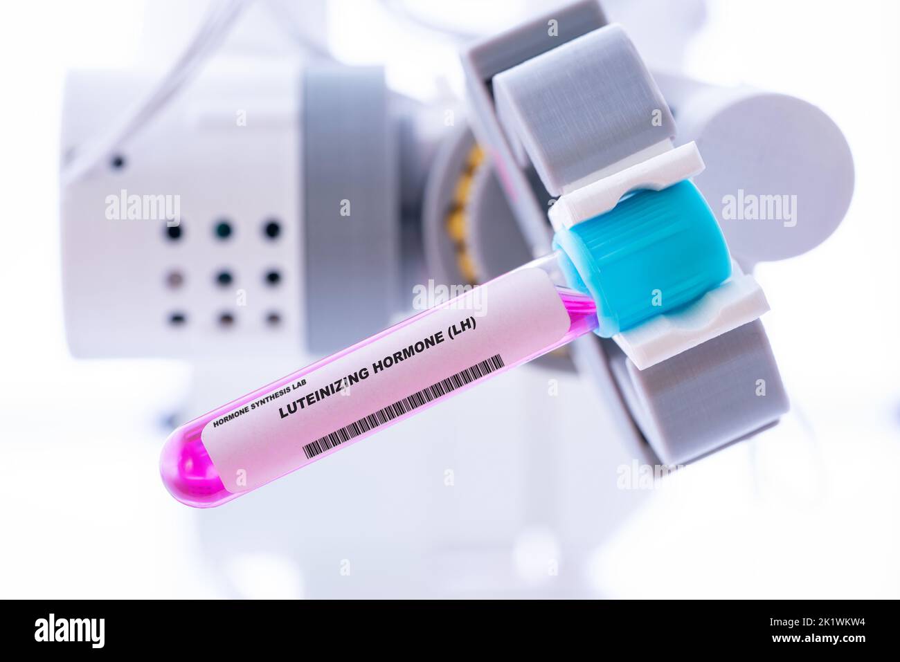 Syringe and vial of luteinizing hormone, conceptual image Stock Photo