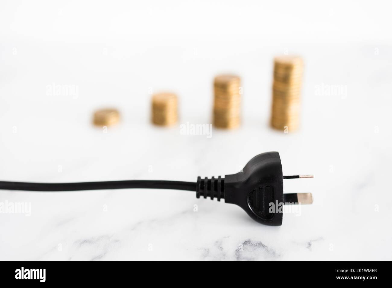 electricity costs going up conceptual image, plug with growing stacks