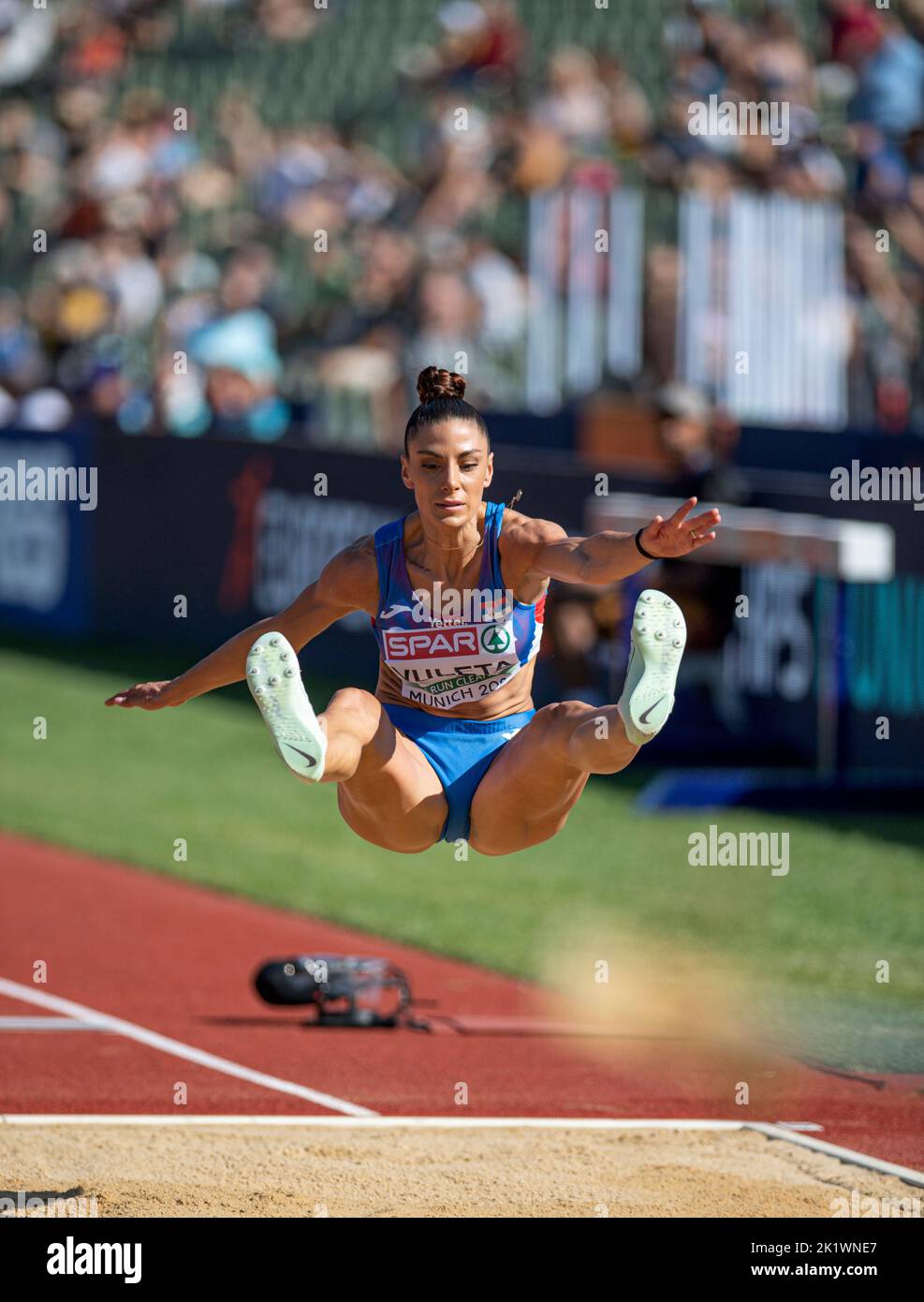 Ivana Spanovic with her country's flag as the winner of the long Jump