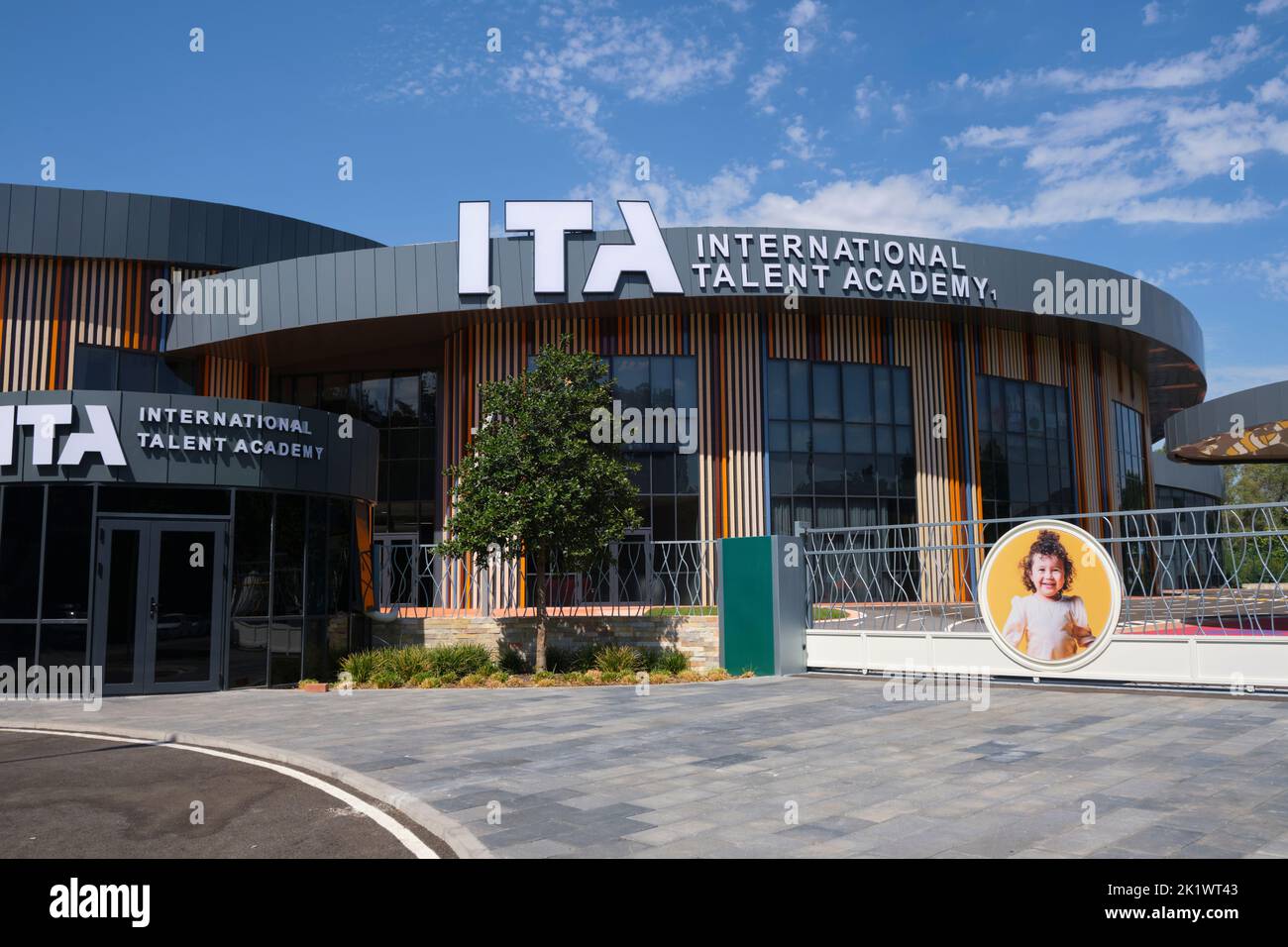 The entrance to the new International Talent Academy, a school specializing in performance arts classes for children, kids. In Tashkent, Uzbekistan. Stock Photo