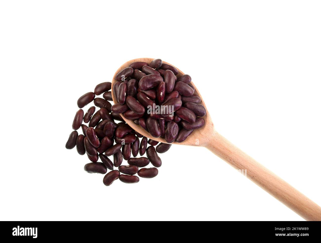 Pulses are edible seeds of leguminous plants such as peas, beans, lentils, etc. Dark red kidney beans, Phaseolus vulgaris, on the image. Stock Photo