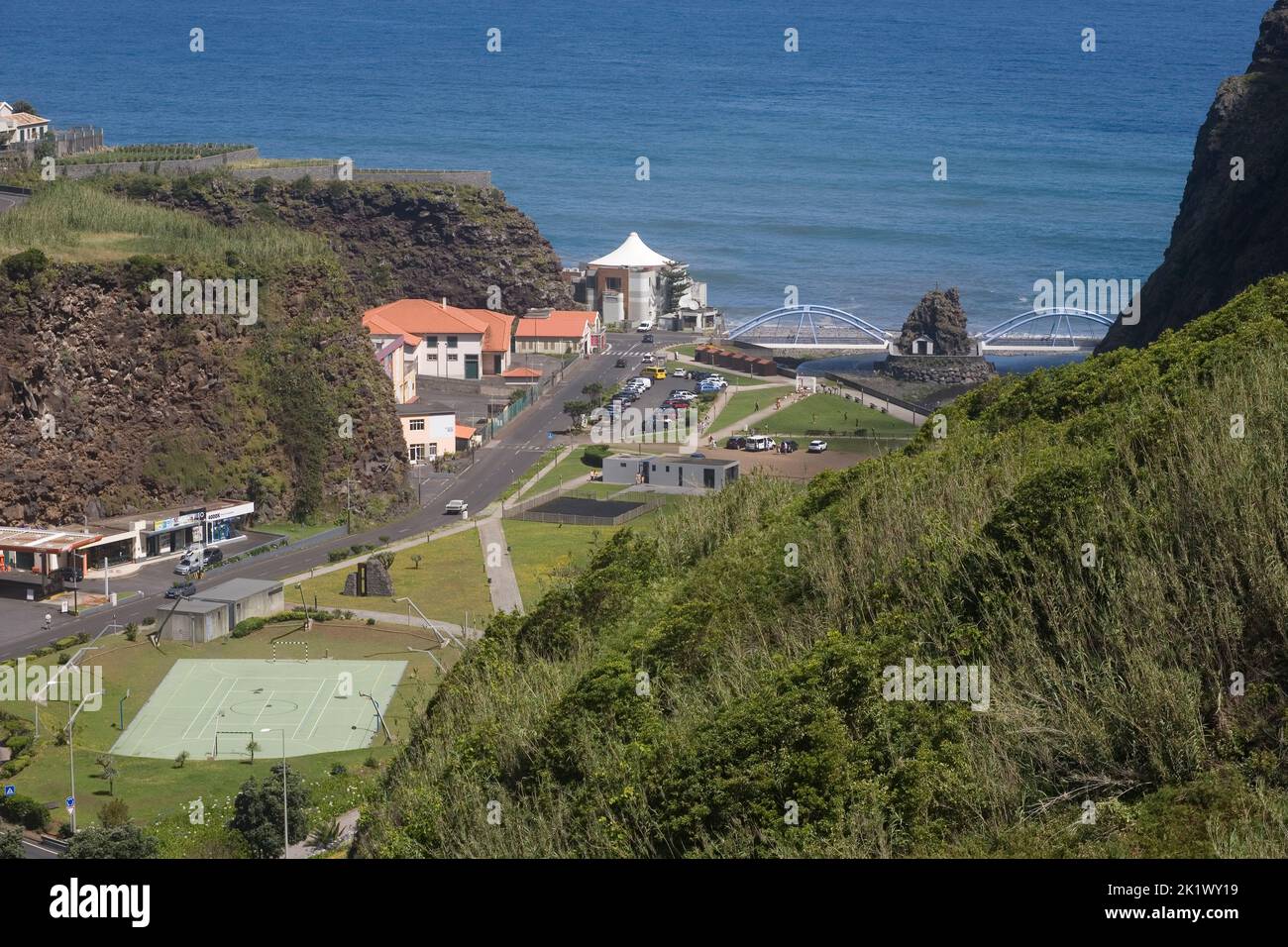 Road through the town of Sao Vicente meets the Atlantic ocean on the North coast of Madeira Stock Photo