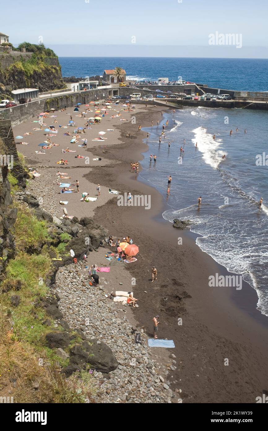 Seixal beach on the North coast of Madeira with beachgoers on Portugal day Stock Photo