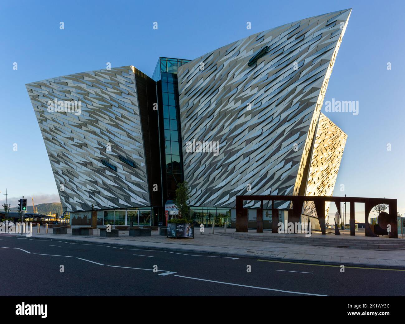 Belfast, United Kingdom - 21 August, 2022: view of the modern aluminium and steel Titanic Museum in the old dockyards of downtown Belfast in mornign l Stock Photo
