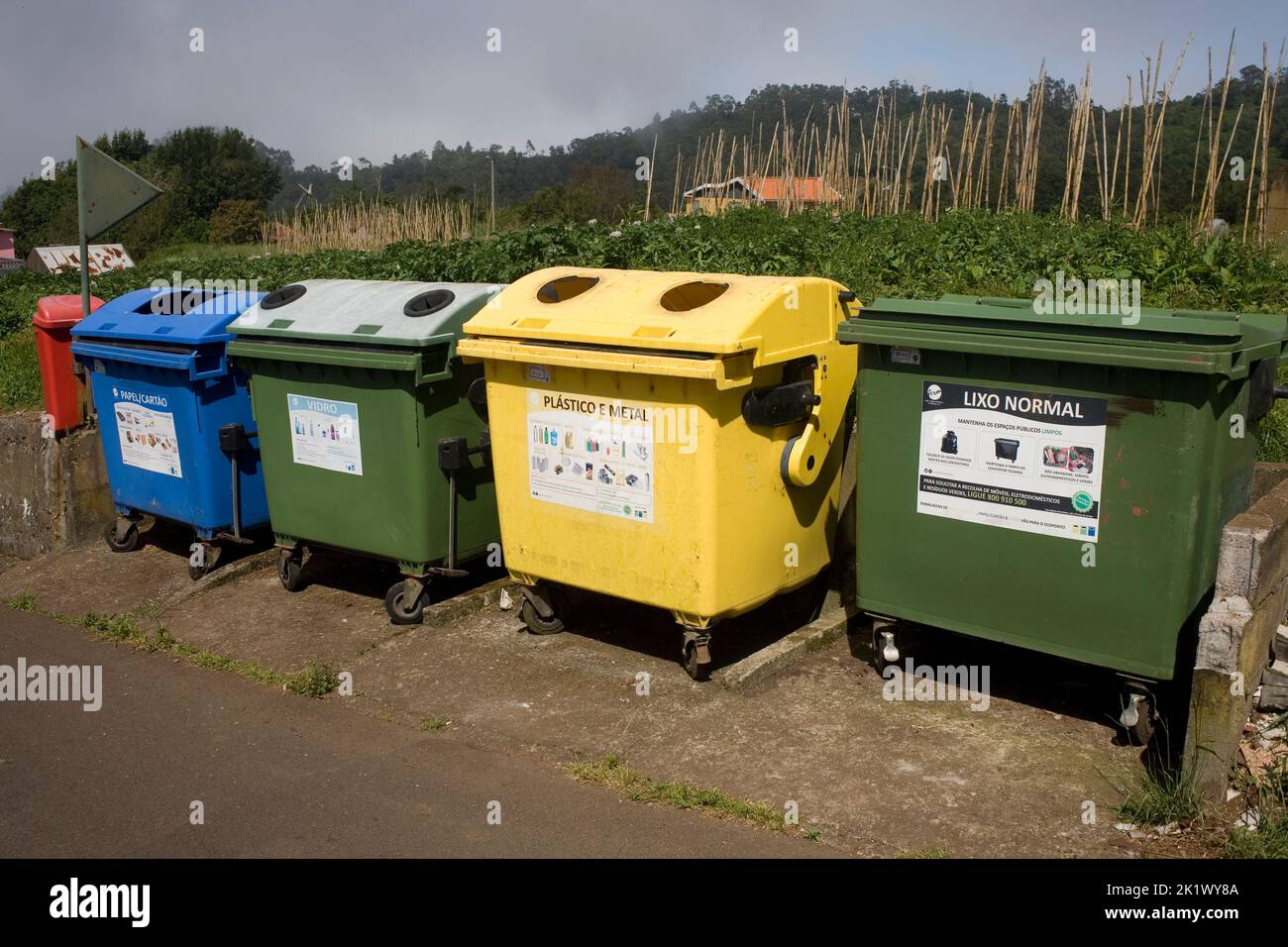 Set of recycling containers in village near Santana in Northern Madeira Stock Photo