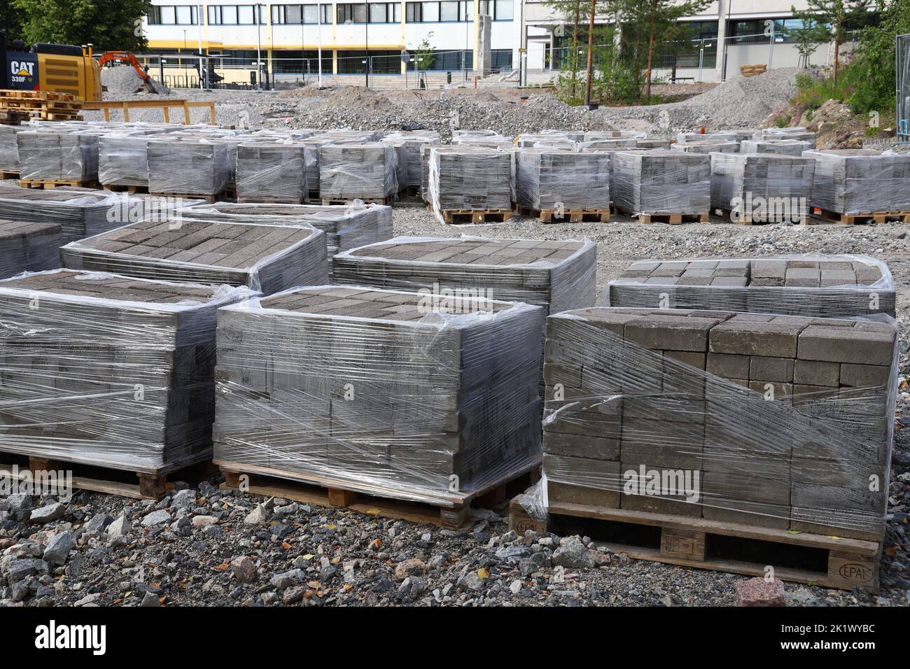 A road bricks wrapped in plastic at the construction site Stock Photo