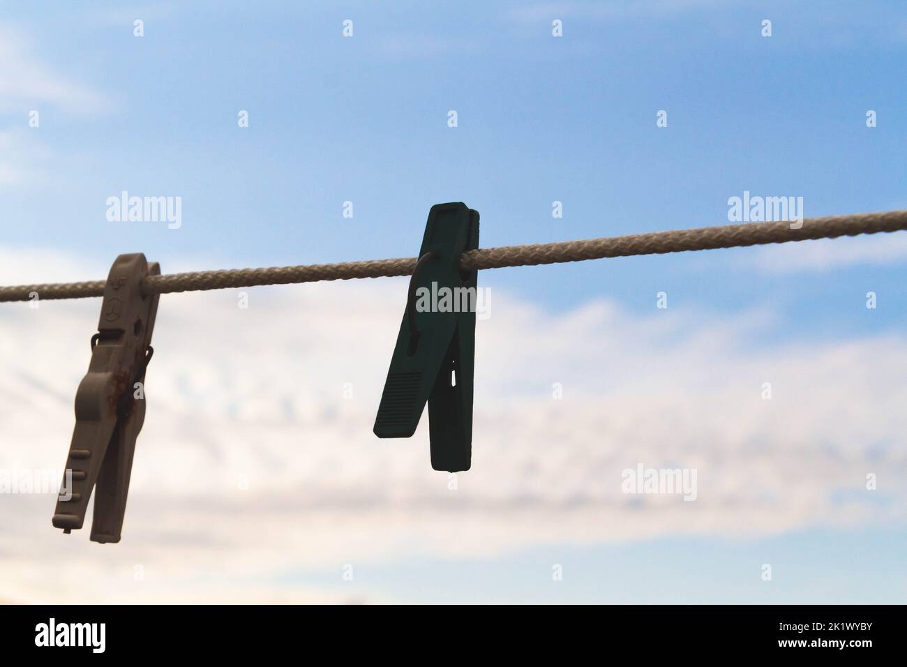 Clothespins for drying clothes on a rope. Clothesline . Laundry washing