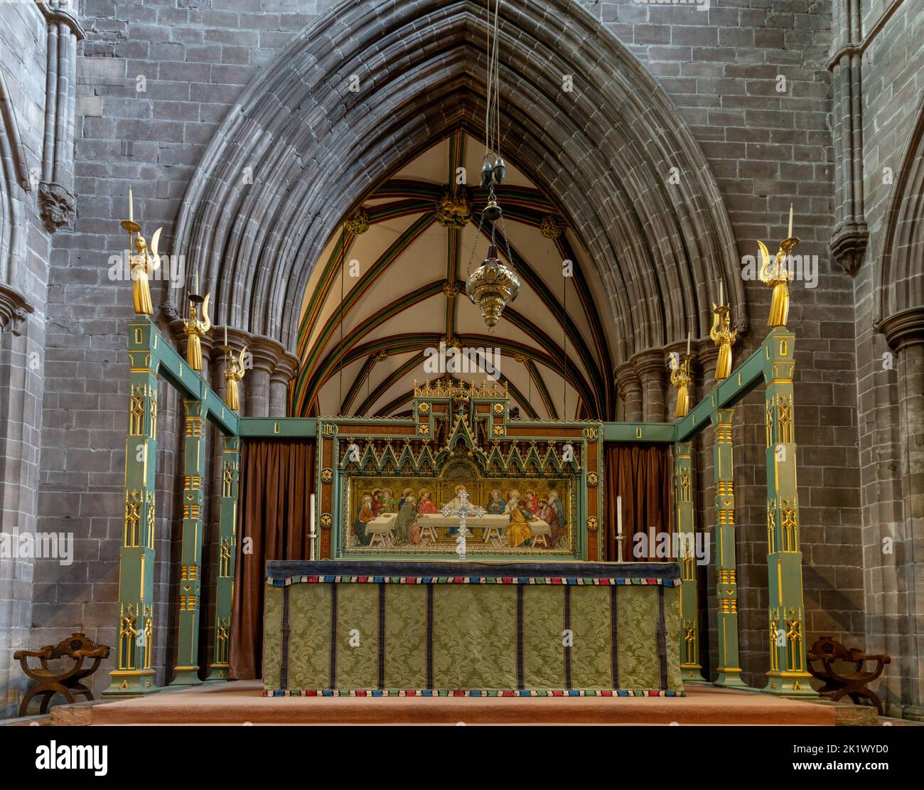 Chester, United Kingdom - 26 August, 2022: ornate gilded altar with the Last Supper painting inside the historic Chester Cathedral in Cheshire Stock Photo